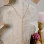 Ellie White Enamel Lariat Necklace in 14k gold filled and sterling silver with minimal drop design